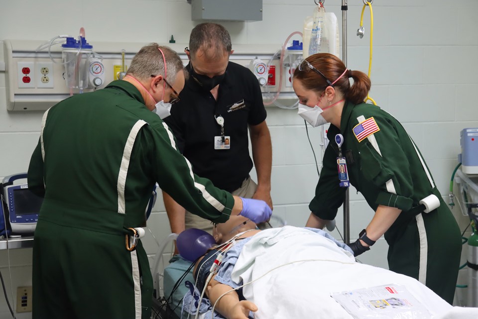 LifeFlight medical personnel demonstrate using a simulated patient in the Bangor SIM lab