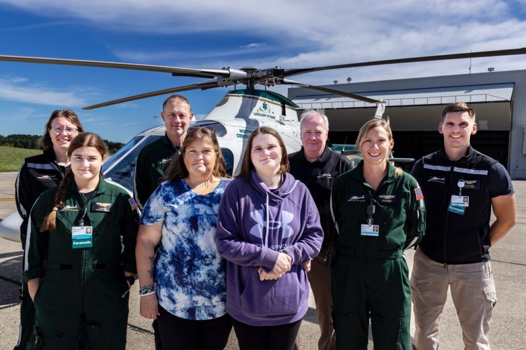 Megan and Kyra day flanked by LifeFlight crew and founder Tom Judge at the Bangor Base, Photo by Ashley L. Conti