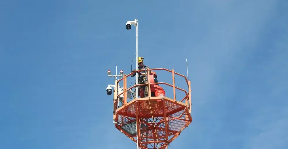 John Rolfson, LifeFlight’s aviation-infrastructure engineer installs a camera on a tower