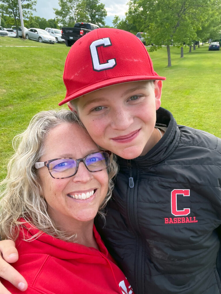 Melanie Lajoie with her son Josh after a baseball game in June 2023.