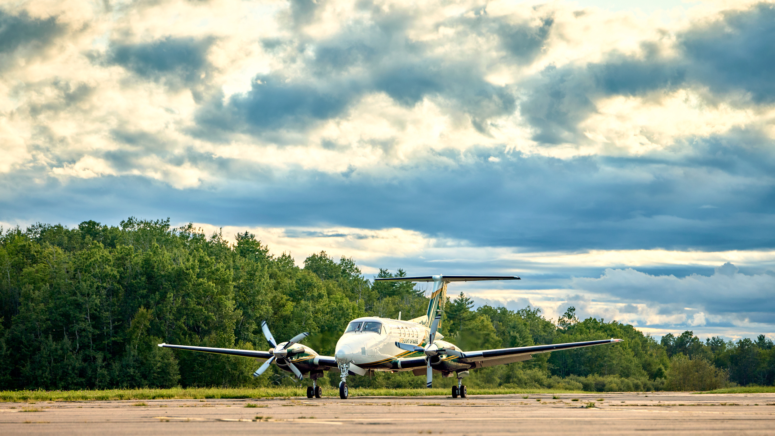 LifeFlight airplane on runway at rural Maine airport