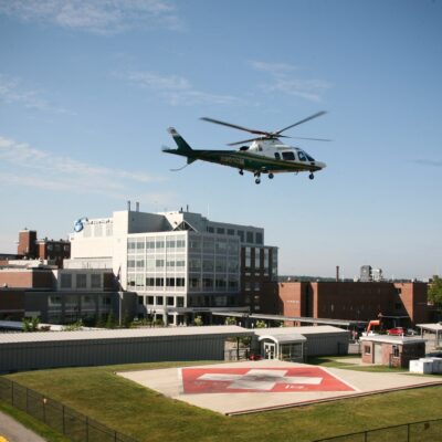 LifeFlight of Maine helicopter prepares to land on helipad.