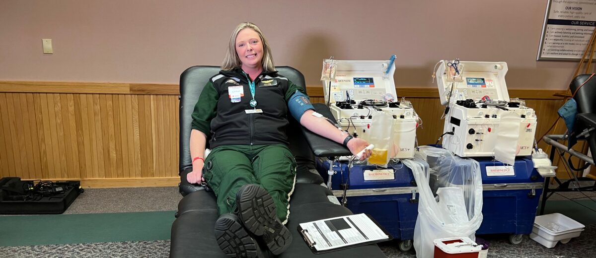 Flight Nurse Kayla Jones donates blood at the "One Lewiston" blood drive.