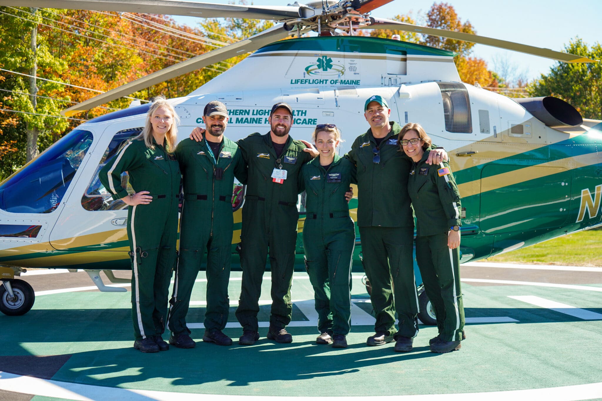LifeFlight crew members standing in front of an aircraft