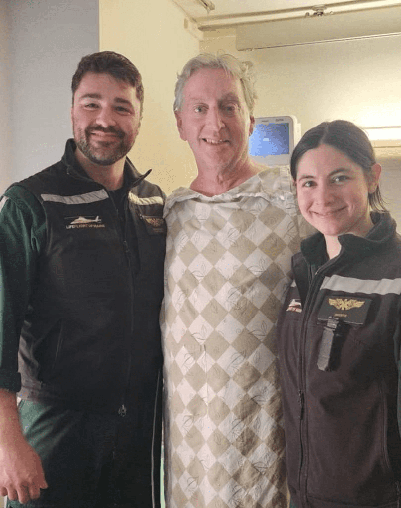 John with Flight Nurses Brandon Mayo and Michelle Fromzel.